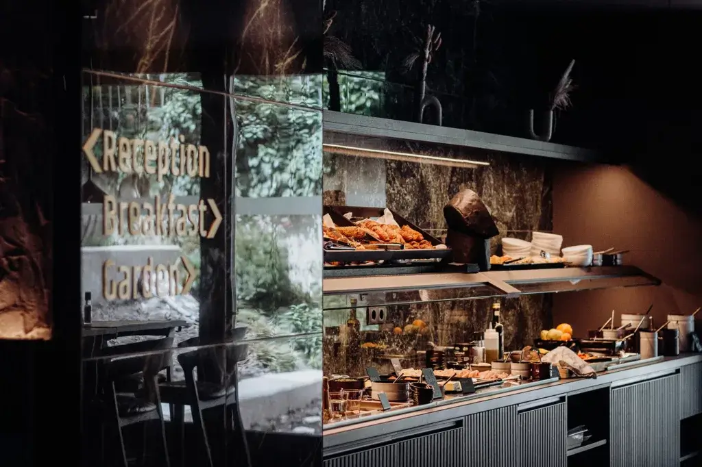 An amazing breakfast in Salzburg, featuring an assortment of fresh ingredients like pastries, eggs, fruits, and local specialties, all beautifully arranged for a delicious and satisfying start to the day.
