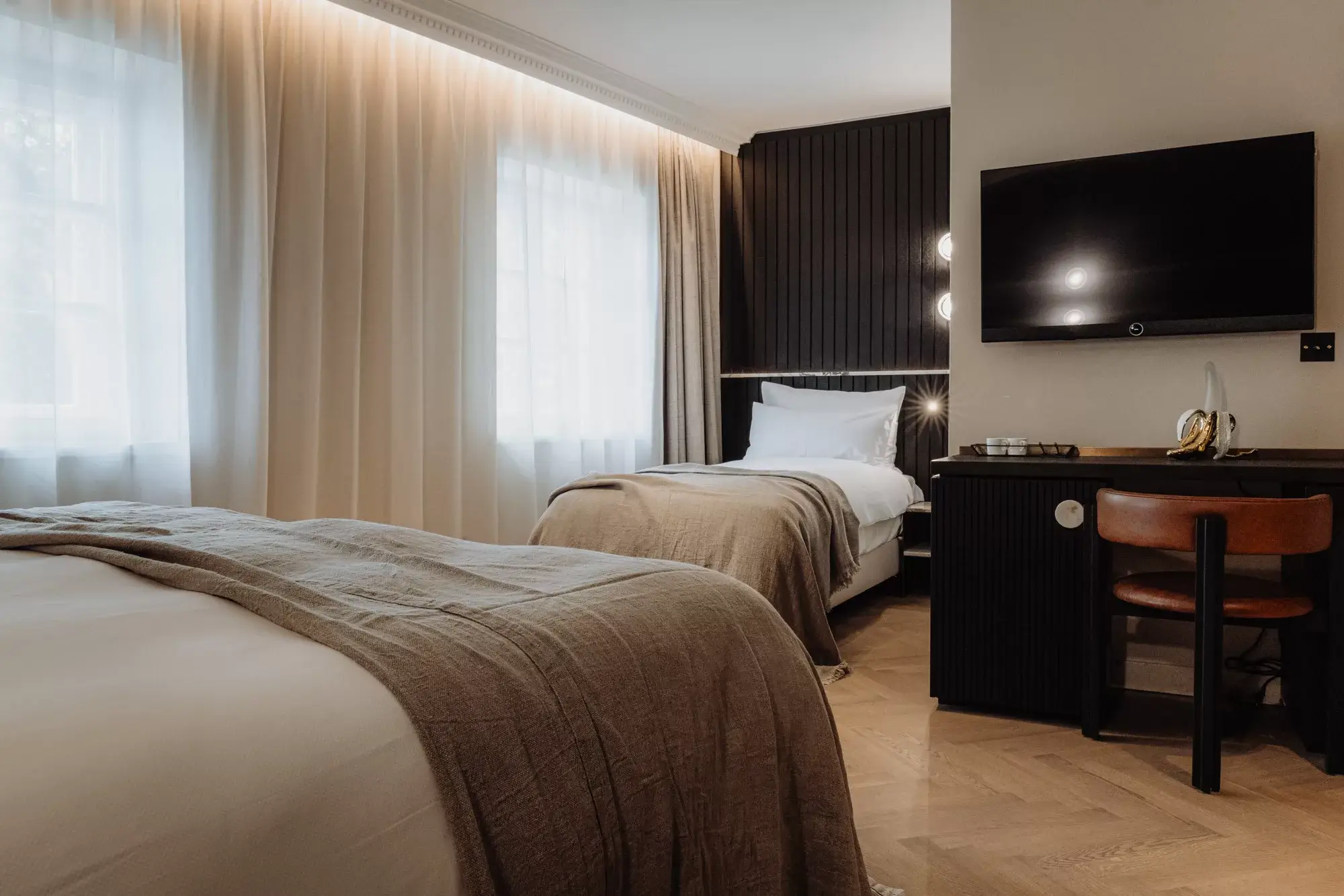 Experience comfort and relaxation in the family room at Gentle Hide, designed to provide a serene and inviting atmosphere for guests.