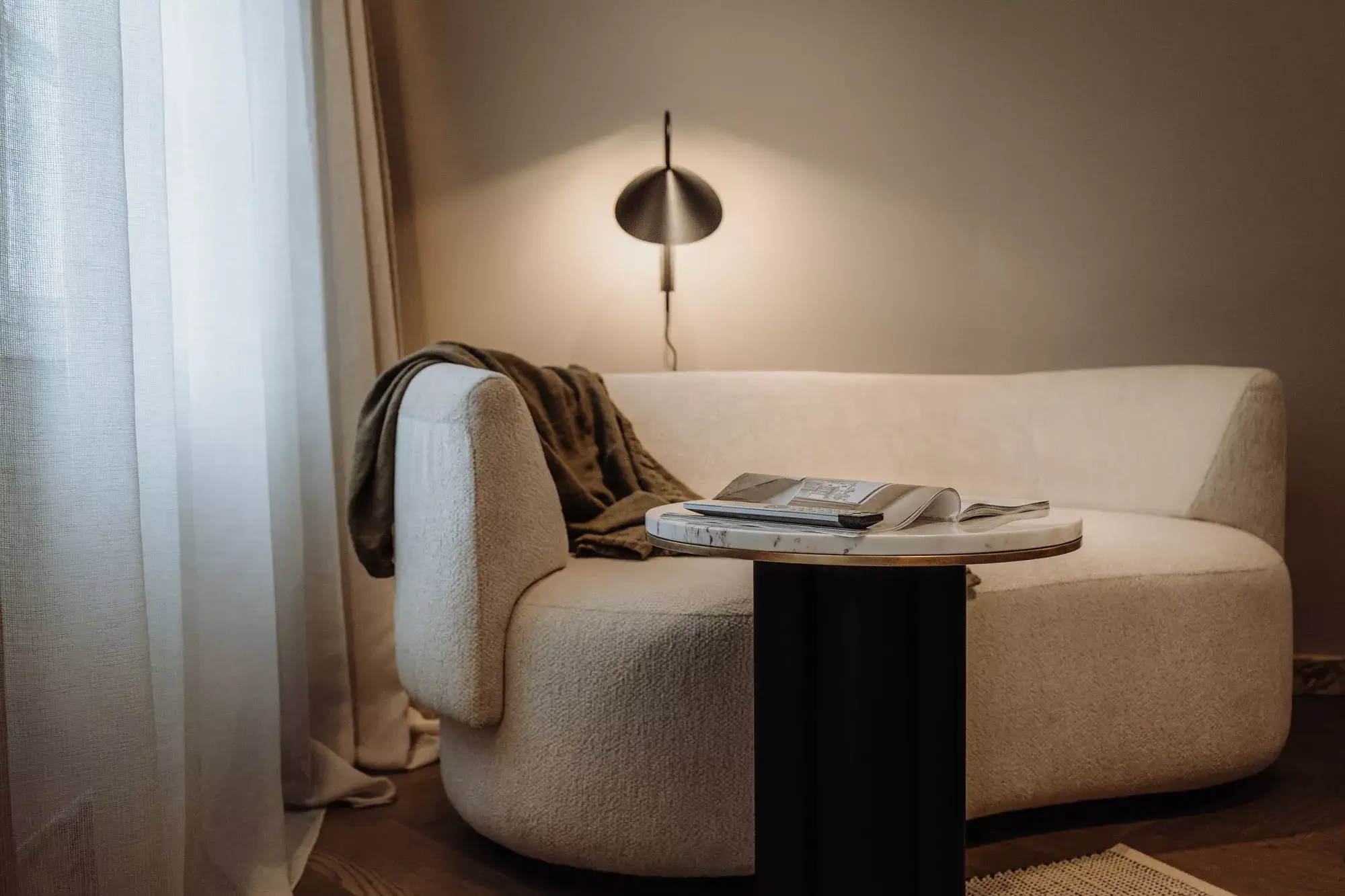 Enjoy the serene lounge area at Gentle Hide, designed for comfort and relaxation in a tranquil and inviting atmosphere.