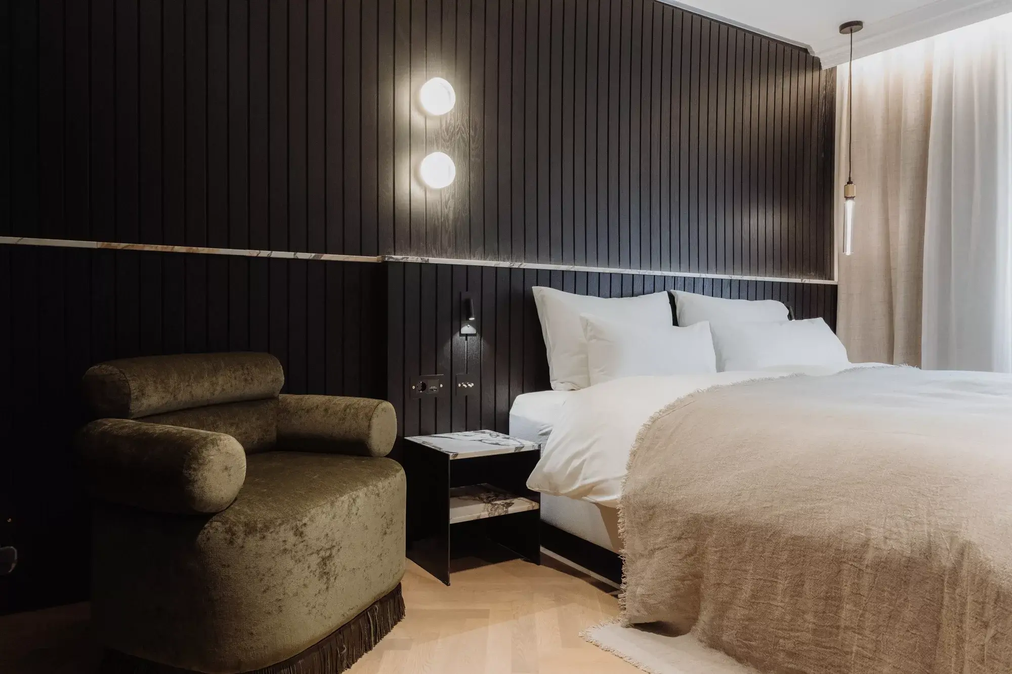 Enjoy the serene lounge area at Gentle Hide, designed for comfort and relaxation in a tranquil and inviting atmosphere.
