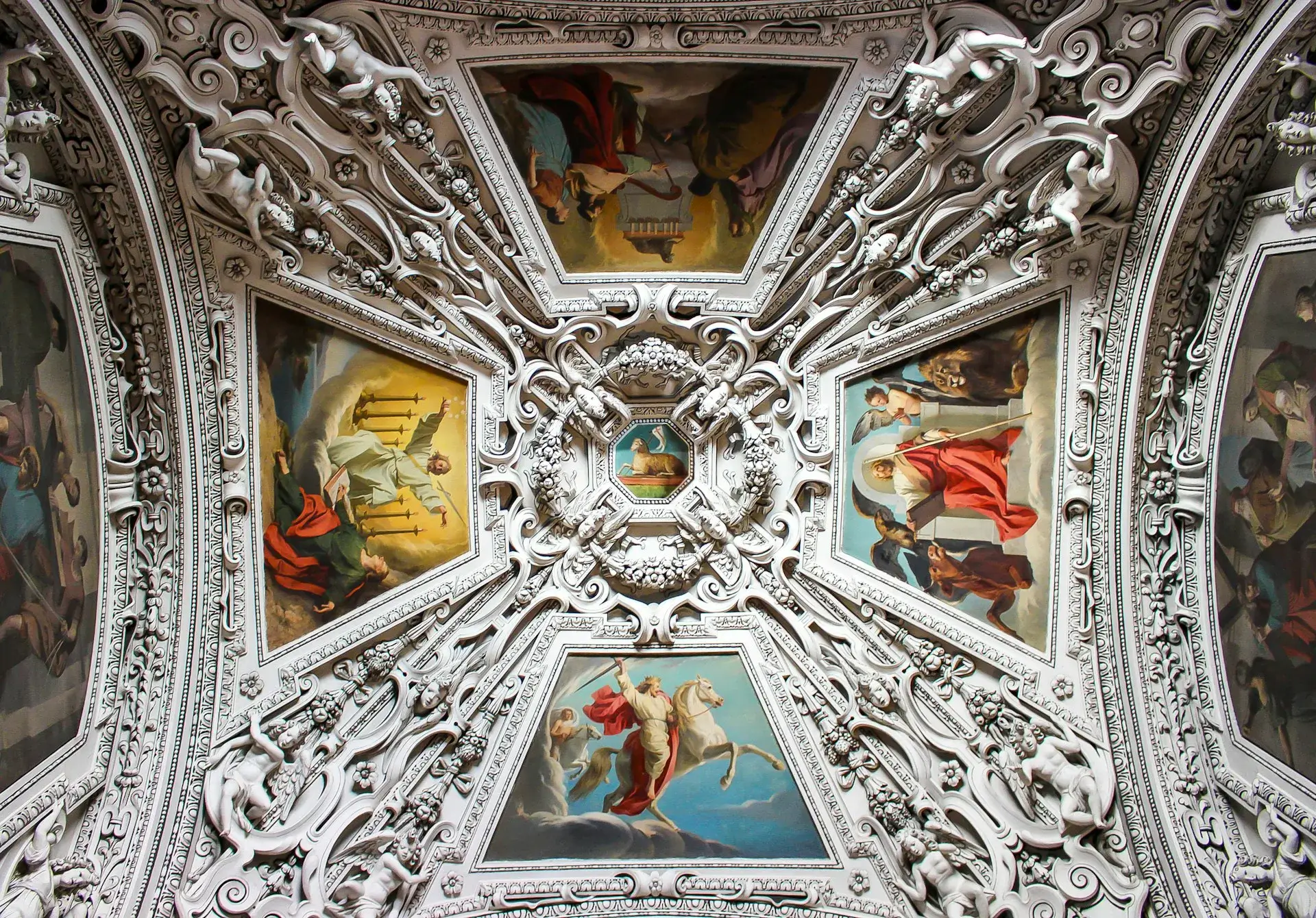 Marvel at the breathtaking medieval ceiling frescoes inside Salzburg Cathedral. Delve into a world of intricate artistry and religious symbolism as you gaze upon these masterpieces, each stroke telling a story of faith, history, and human ingenuity.