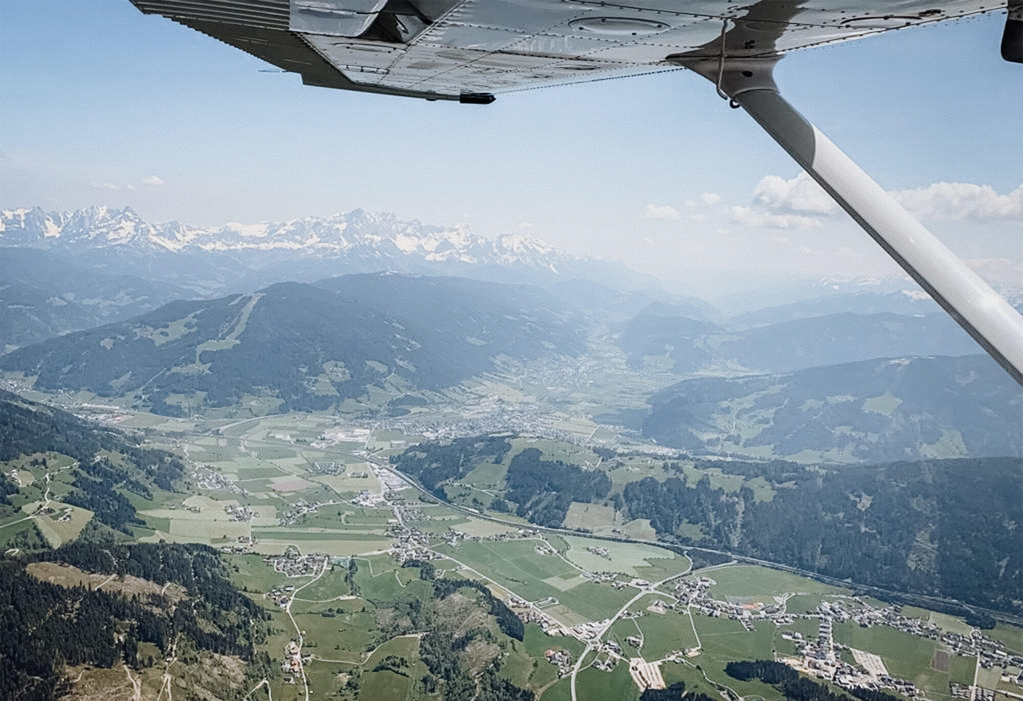 Enjoy a stunning view over Salzburg during a private flight, capturing iconic landmarks and picturesque landscapes from above.