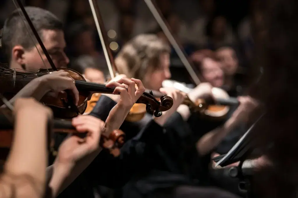 Experience the soul-stirring melodies of a classical concert in Salzburg, as a virtuoso violinist takes center stage. Let the enchanting music transport you to another realm, where the timeless compositions of Mozart and other masters come to life in the city's historic venues.