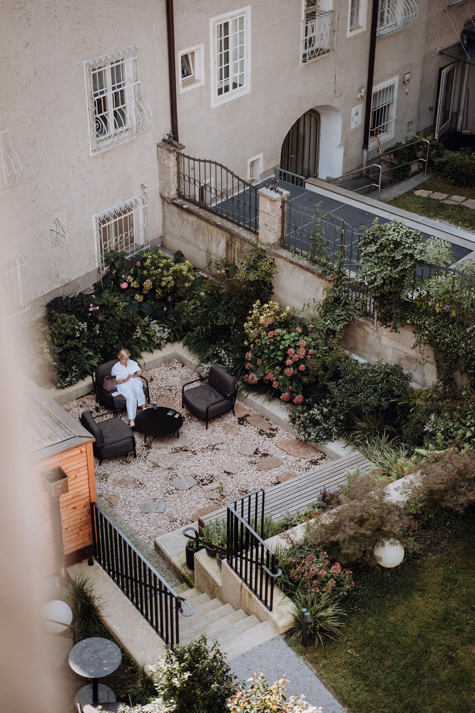 View from a room at Gentle Hide Designhotel overlooking the quiet garden in Salzburg.